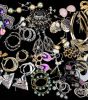 Earrings & More Earrings. Over 40 pair of pierced earrings featuring a pair of iridescent Image - 2