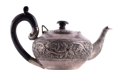 Chinese/Japanese 19th C. Silver Teapot. A Chinese or Japanese 19th C silver teapot with embossed 