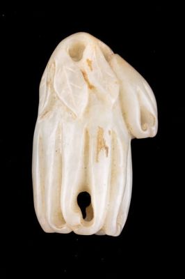 Chinese Carved Jade Robe Weight, Flower Form. A Chinese carved jade pendant or robe weight 