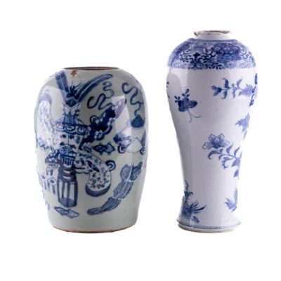 Two Chinese Blue + White Vases. Two chinese blue and white vases, taller of the two measuring 