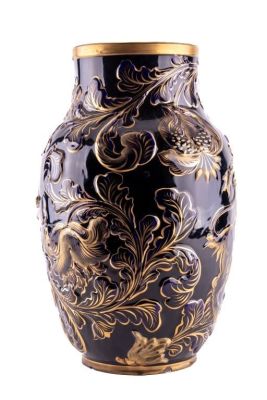 Pottery Vase. A pottery vase, likely asian, with a mark and a hole drilled into the bottom. The 