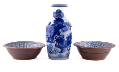 Three Pieces of Blue + White Porcelain. A matching pair of blue and white bowls with brown 