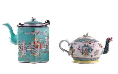 Two Chinese Teapots, one measuring approx. 6" and another 4". First teapot has a four character 