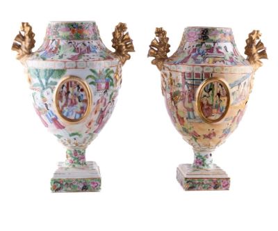 Pair of Rose Medallion Urns w/ Repair. A pair of large rose medallion urns, with a repair on one 
