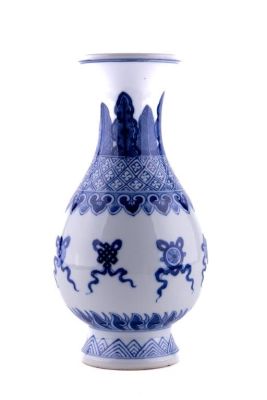 Chinese Blue and White Vase. A Chinese blue and white vase measuring approx. 9.25" high x 4.5" 