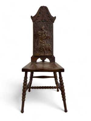 Highly Carved Oak Side Chair. Highly carved side chair with north wind carving above a depiction 