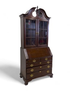Two Piece Harden Secretary Desk. A Harden two piece secretary desk with glass shelves included. 