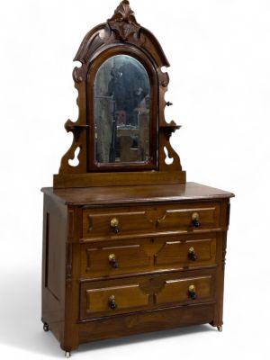 Large Victorian Dresser w/ Mirror. A large Victorian dresser with mirror, mirror has carvings of 