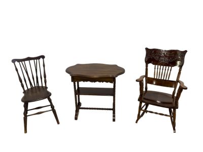 Victorian Furniture Grouping. A grouping of furniture including a decoratively carved rocking 