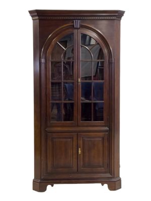 Large One Piece Corner Cupboard. A large dark wood one piece corner cupboard with keys included 