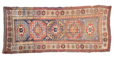 Early Kazak Area Rug. Early Kazak area rug measures approx. 50" x 113". Condition: Absence of a 