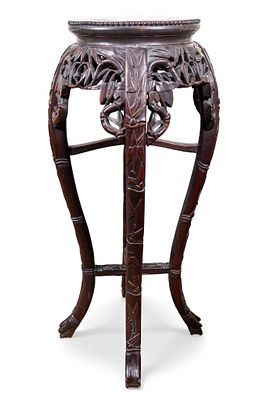 Chinese Carved Rosewood Pedestal/Planter Stand. Carved rosewood display pedestal featuring an 