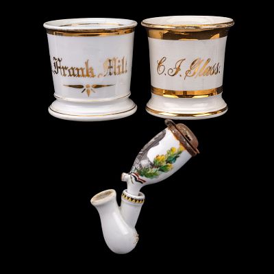 Antique Porcelain Shaving Mugs & Painted Pipe. A collection of two antique porcelain shaving 