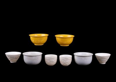 Chinese Porcelain Tea Cup Collection. A collection of 8 Chinese porcelain tea cups featuring a 
