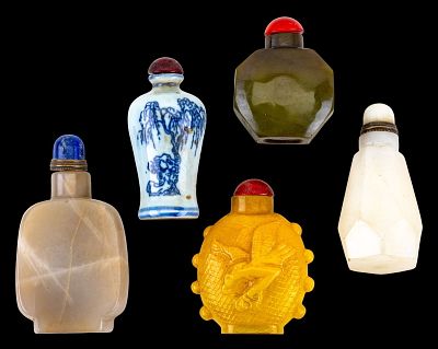 Chinese Snuff Bottles. An assortment of Chinese snuff bottles featuring materials such as yellow 