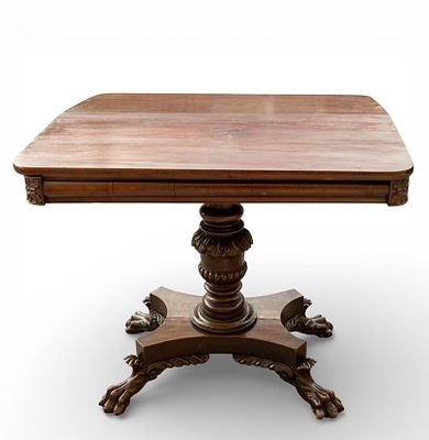 Mahogany Empire Card Table. Period mahogany empire card table with claw feet. Measures approx. 