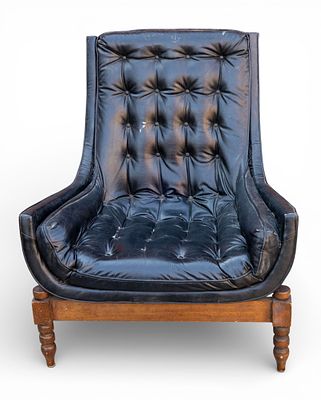 Mid-Century Tufted Black Leather Lounge Chair. Mid-century tufted black leather lounge chair on 