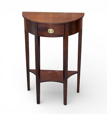Mahogany Half-Moon Console Table. Mahogany half-moon single-drawer console table. Measures 
