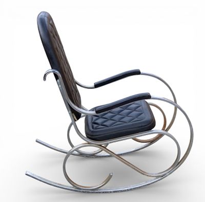 Vintage Sculptural Chrome Rocking Chair. Vintage black upholstered and chrome sculptural MCM 