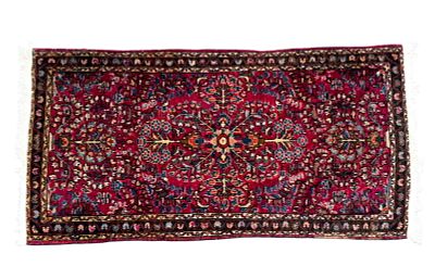 Antique Sarouk Area Rug. Antique Sarouk area rug with white fringe and floral pattern. Measures 