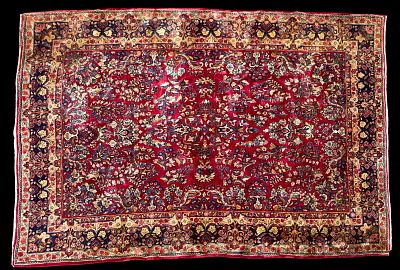 Antique Sarouk Area Rug. Antique large Sarouk area rug with red field and floral motifs. 