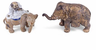 Two Early Asian Elephant Figurines. Vintage ceramic or clay figurine of a Lohan riding an 