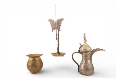 Etched Brass Cache & Candlestick, and More. A hammered and etched metal antique Turkish coffee 