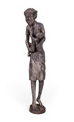 Tall Hand-Carved African Wooden Sculpture. Tall African hand-carved wooden sculpture depicting a 