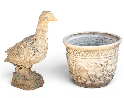 Plaster Goose and Plastic Garden Bucket. Plaster garden sculpture depicting a goose along with a 