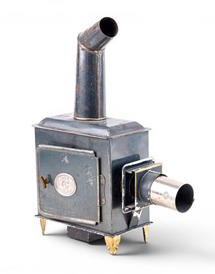 Ernst Plank Magic Lantern. An antique Ernst Plank Magic Lantern featuring a tin housing with 