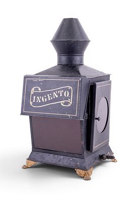Ingento Magic Lantern. An antique Ingento Magic Lantern projector featuring a black metal 