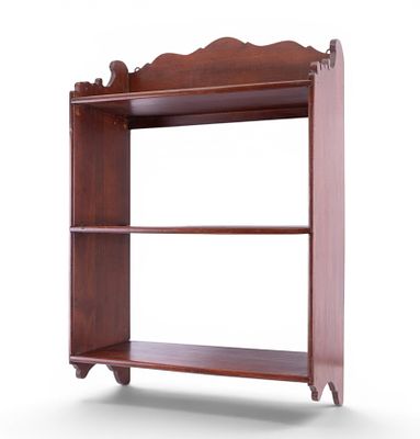 Carved Wood Hanging Wall Shelf. Small stained wood wall shelf featuring shaped crest rail 