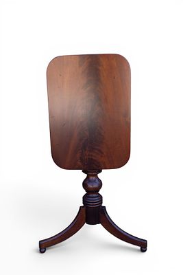 Period Mahogany Tilt Top Table. A period mahogany tilt top side table, measures approx. 23.25" W 