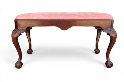 Vintage Hickory Chair Co. Pink Upholstered Bench. A vintage carved wood bench featuring claw and 