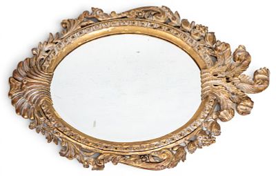 Giltwood and Gesso Oval Wall Mirror. Decorative oval wall beveled mirror in a carved giltwood 