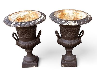 Pair of Cast Iron Handled Urns. Cast Iron decorative urns with handles and black finish. Each 