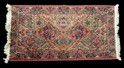 Karastan Kirman Area Rug. Karastan Kirman area rug. Karastan label present to underside. 