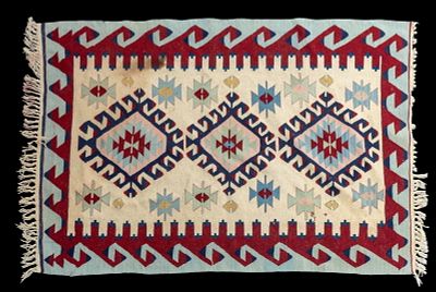 Turkish Kilim Area Rug. Turkish Kilim area rug featuring repeating diamond motifs. Measures 
