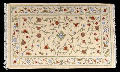 Beige Wool Rug with Floral Design. Wool area rug with repeating multicolor floral design against 