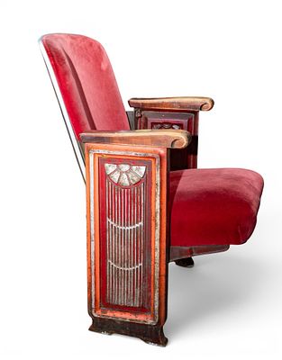 Art Deco Period Theater Seat. Art Deco period upholstered theater seat with paneled metal ends 