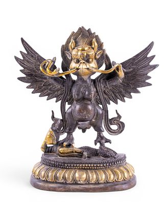Chinese Bronze Garuda Temple Statue. A small Chinese bronze temple statue depicting Garuda 