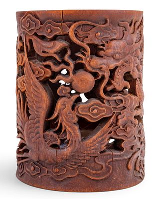 Chinese Pierced Bamboo Brushpot. A Chinese bamboo brush pot featuring a pierced dragon and 