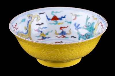 Chinese Yellow-Ground Dragon Porcelain Bowl. Chinese porcelain bowl featuring a yellow exterior 