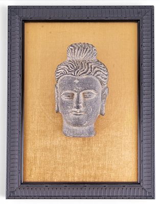 Stone Head of Buddha w/ Plaque. Carved gray stone head of Buddah featuring elongated earlobes 
