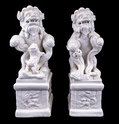 Chinese Blanc de Chine Porcelain Foo Dogs Pair. Vintage pair of Chinese blanc de Chine porcelain 