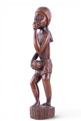 Vintage African Hand-Carved Figural Sculpture. Vintage mid-20th century hand-carved African 