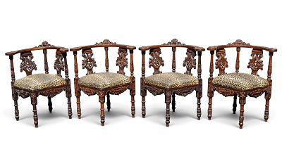 4 Carved Ornate Wooden Corner Chairs. Set of four heavily carved Renaissance Revival style oak 