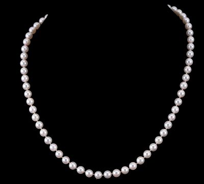 Single-Strand Knotted Pearl Necklace W/ 14k Clasp. A classic single-strand knotted natural pearl 