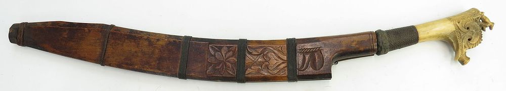 Lot 248: A RARE DAYAK HEADHUNTER LANGGAI TINGGANG SWORD