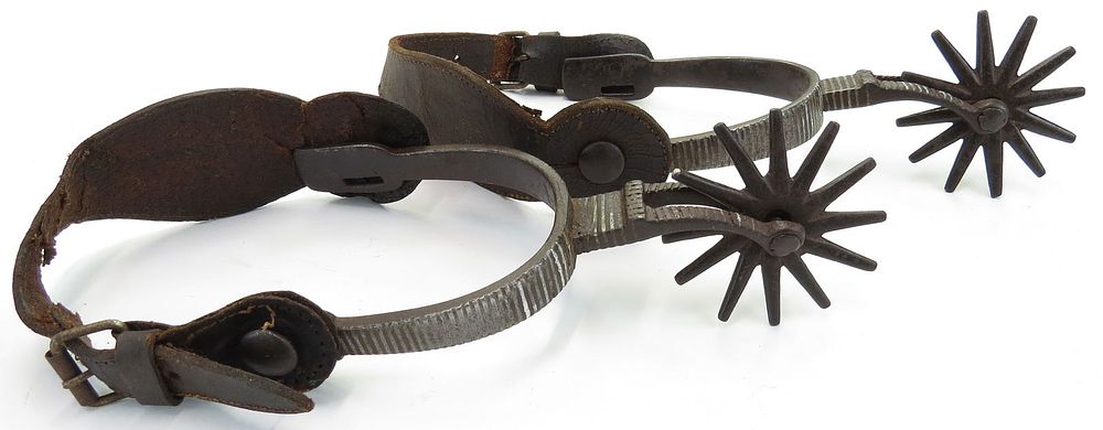 Lot 318: A PAIR OF MEXICAN SPURS